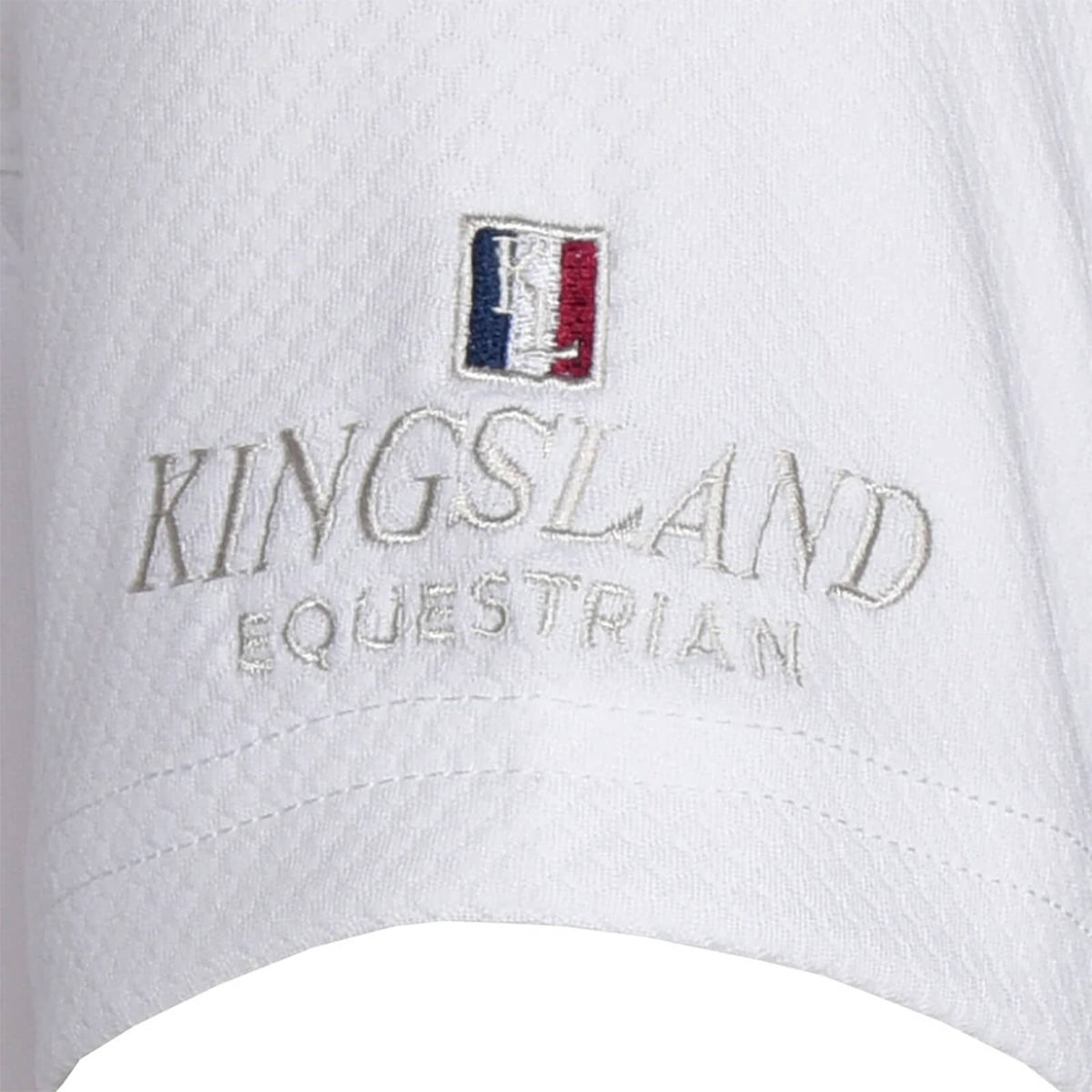Turniershirt Kinder Classic Boys SS Show Shirt, Weiß, Detailaufnahme des Kingsland-Logos auf dem Shirt.