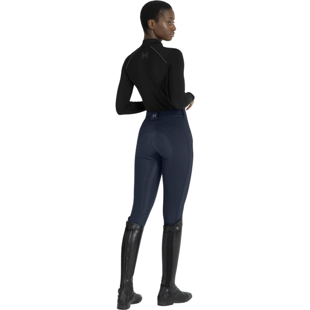 Maximilian Equestrian Reithose Damen Full-Grip Arctic Fleeced Breeches, Dunkelblau, Person trägt die Reithose.