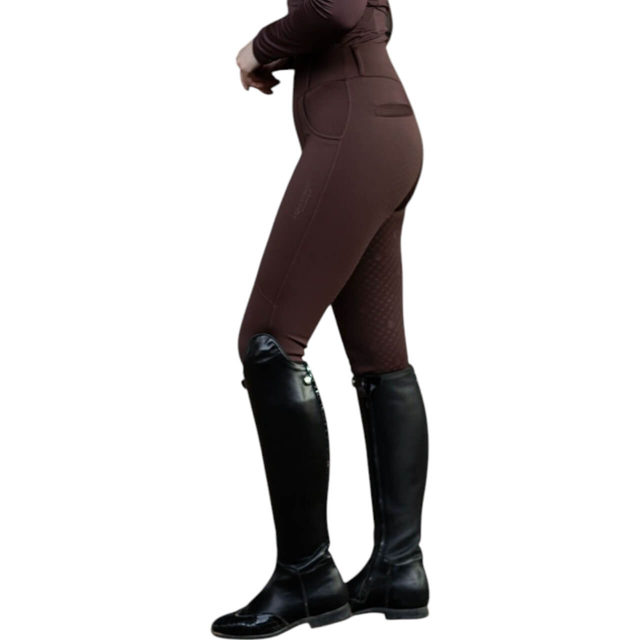 Reithose Damen Full-Grip Compression Supreme Dressur Hose, braun, Person trägt sie im Stehen.