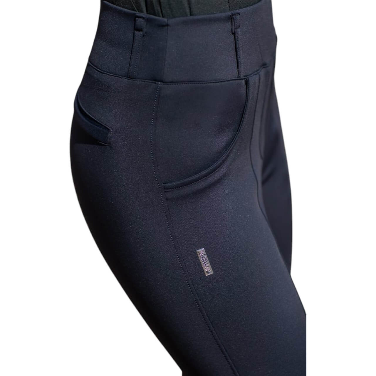Reithose Damen Full-Grip Compression Supreme Dressur Hose, schwarz, Detailaufnahme an einer Person getragen.