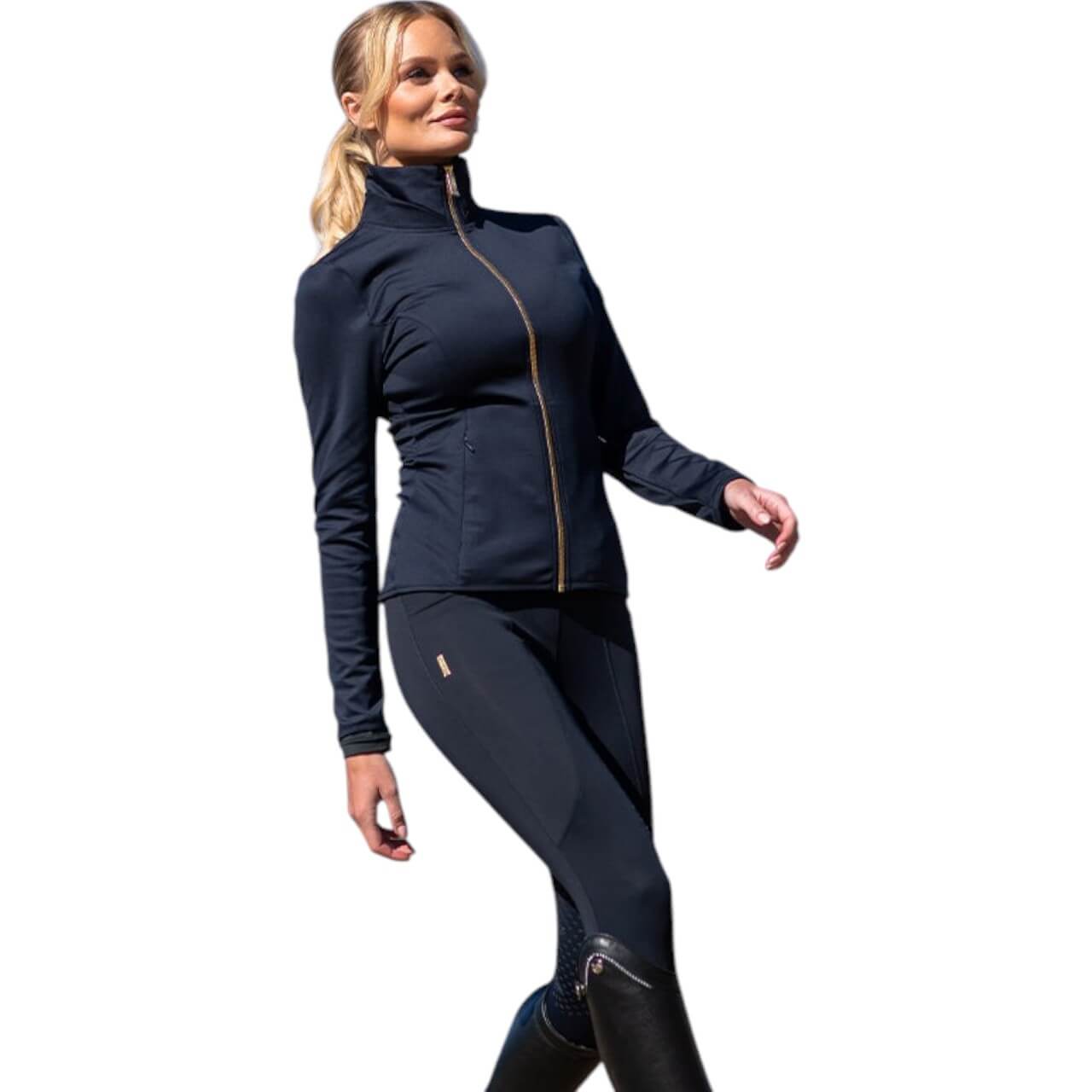 Reithose Damen Full-Grip Compression Supreme Dressur Hose, Damen im dunkelblauen Outfit.
