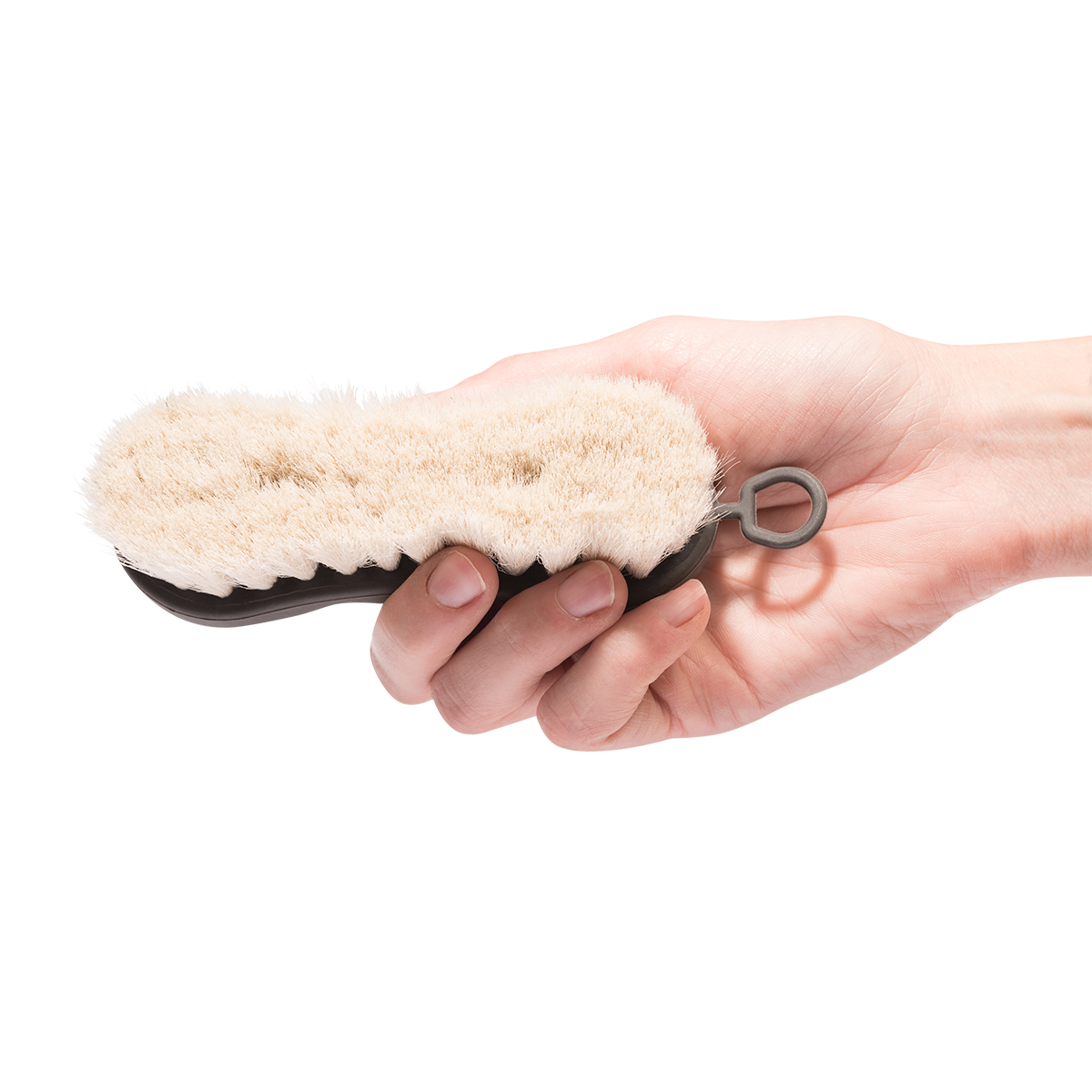 Animalon Gesichtsbürste Ziegenhaar Staubbürste weiche Borsten, Detailaufnahme in der Hand.