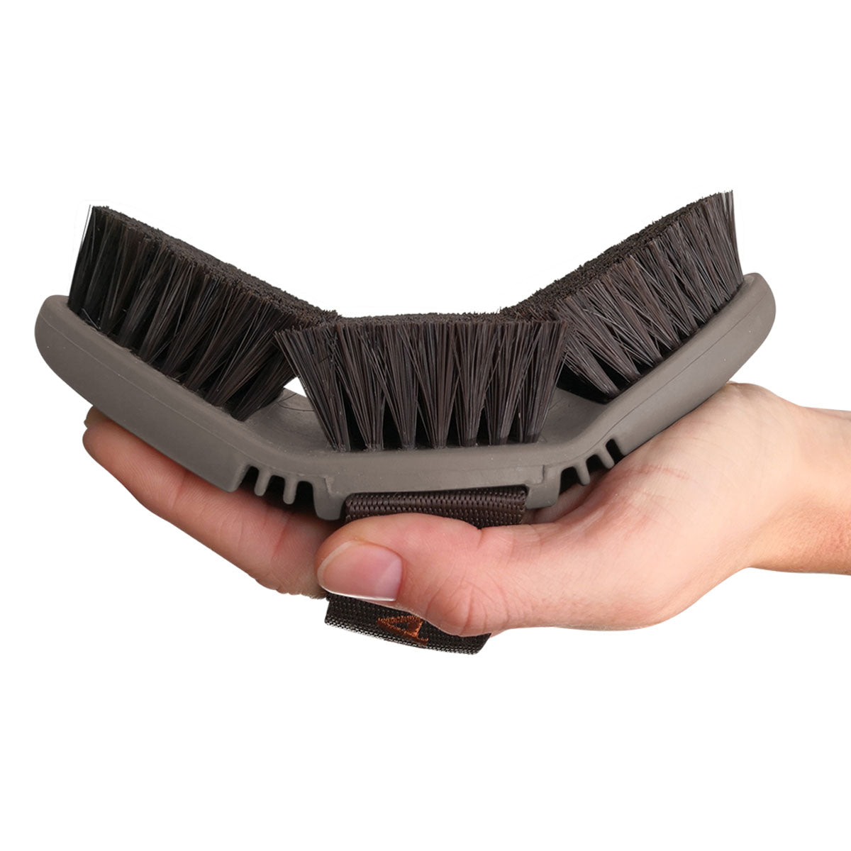 Animalon Kardätsche CareFlex Pferdebürste, Grau, Detailaufnahme in der Hand.